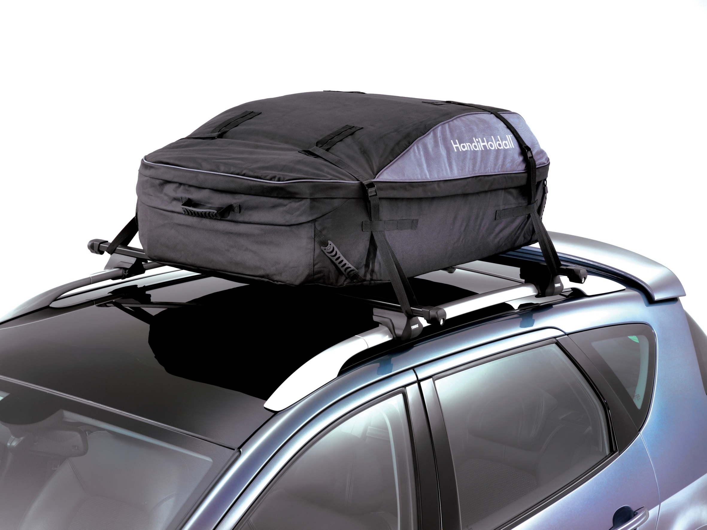 Soft luggage boxes on the roof of a car - rating of the best models