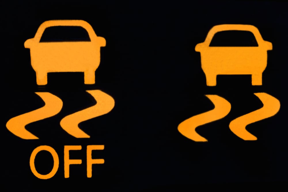 Is it safe to drive with the Traction Control (TCS) light on?