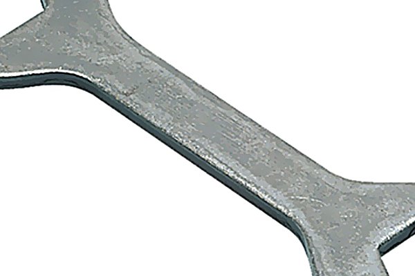What parts does a double-ended compression wrench for fittings consist of?